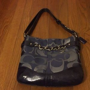 Great condition small coach pocketbook